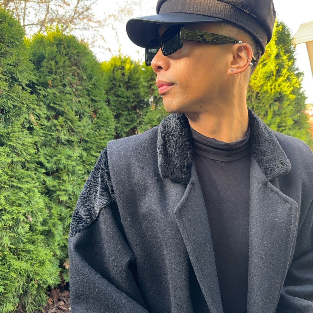 Black vintage wool blend Trench. Sleek and sharp design with unique fur details